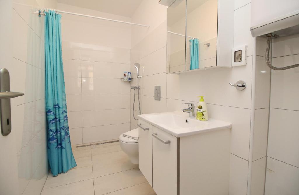 Koupelna v ubytování Apartment Svid
