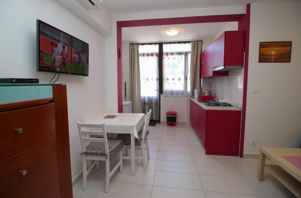 TV a/nebo společenská místnost v ubytování Apartment Svid