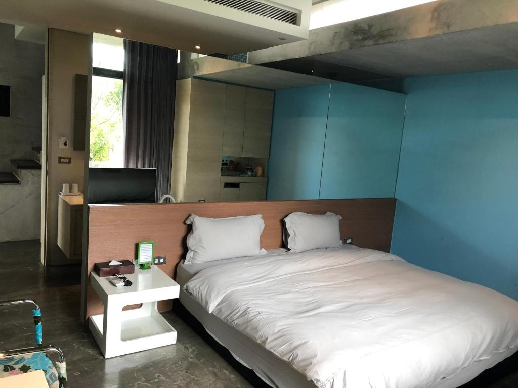 Postel nebo postele na pokoji v ubytování One Piece B&B