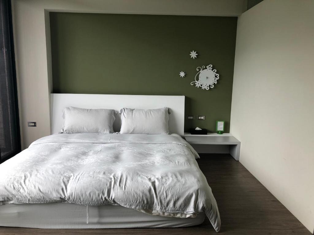 Postel nebo postele na pokoji v ubytování One Piece B&B