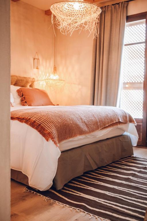 Postel nebo postele na pokoji v ubytování Nomad Hotel - Xábia Port