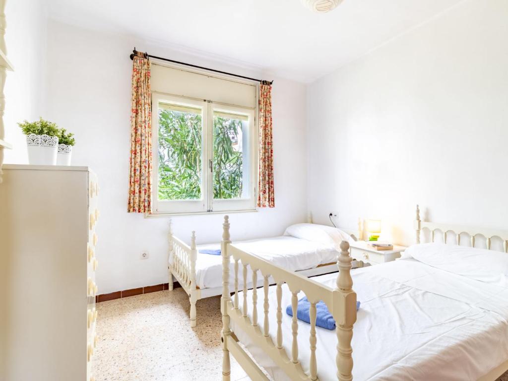 Postel nebo postele na pokoji v ubytování Holiday Home People I by Interhome