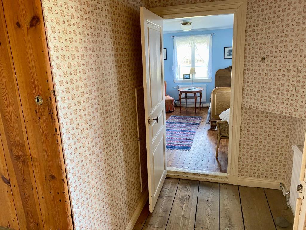 Postel nebo postele na pokoji v ubytování Wallby Säteri