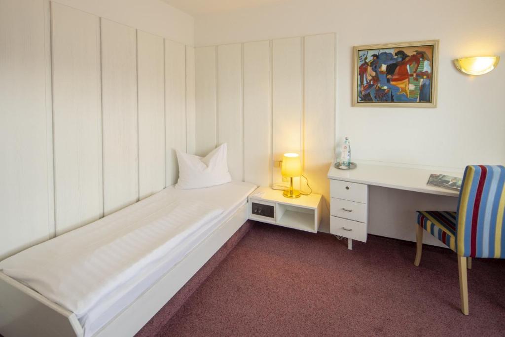 Postel nebo postele na pokoji v ubytování Hotel Gloria Superior