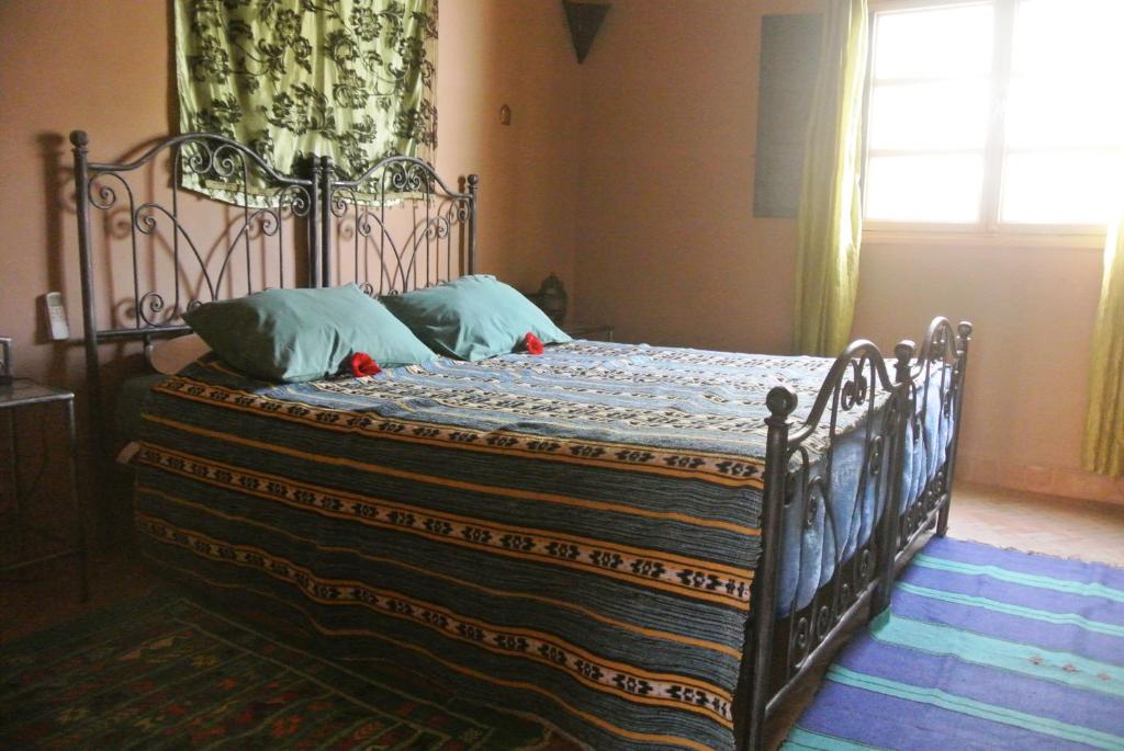 Postel nebo postele na pokoji v ubytování Riad Anma
