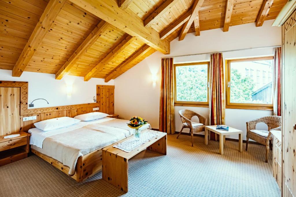 Postel nebo postele na pokoji v ubytování Gasthof Teiser Stern