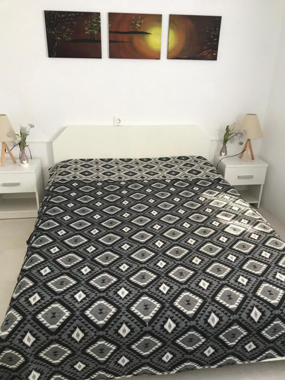 Łóżko lub łóżka w pokoju w obiekcie Stegna Breeze