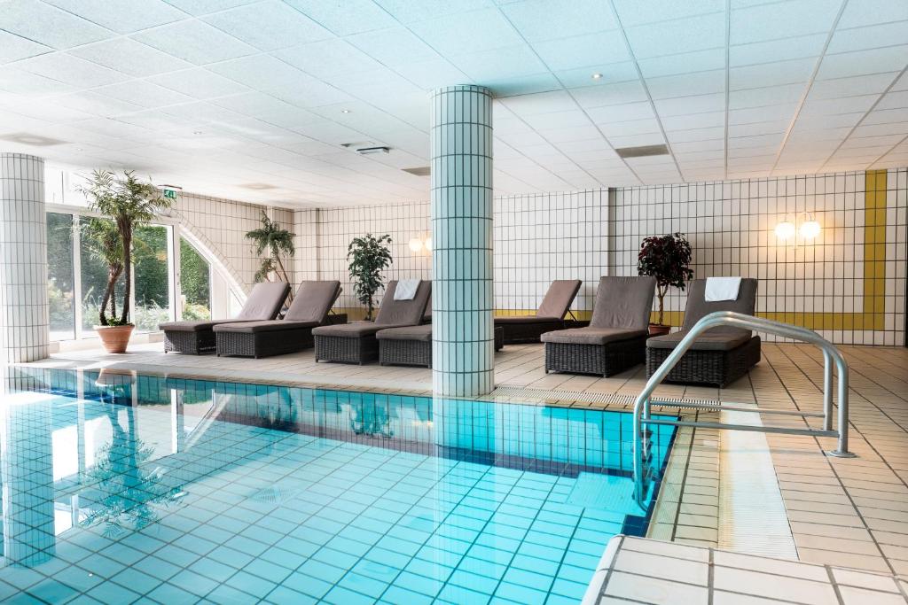 Bazén v ubytování WestCord Hotel Schylge nebo v jeho okolí