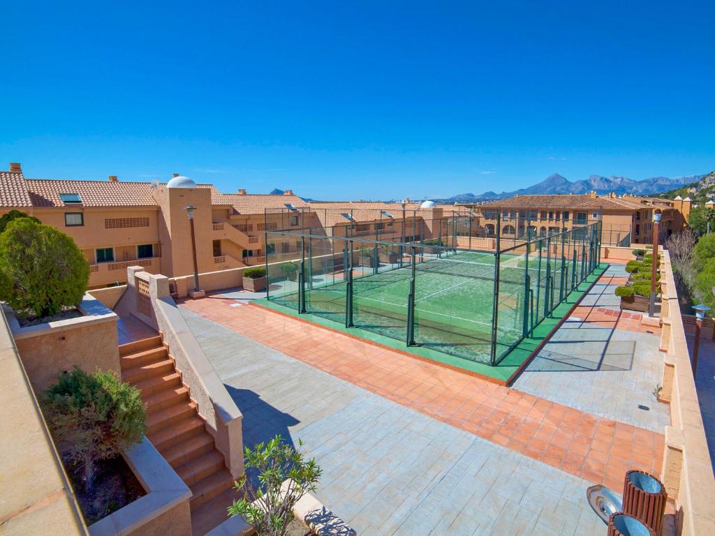 The swimming pool at or close to Apartment Pueblo Mascarat-2 by Interhome
