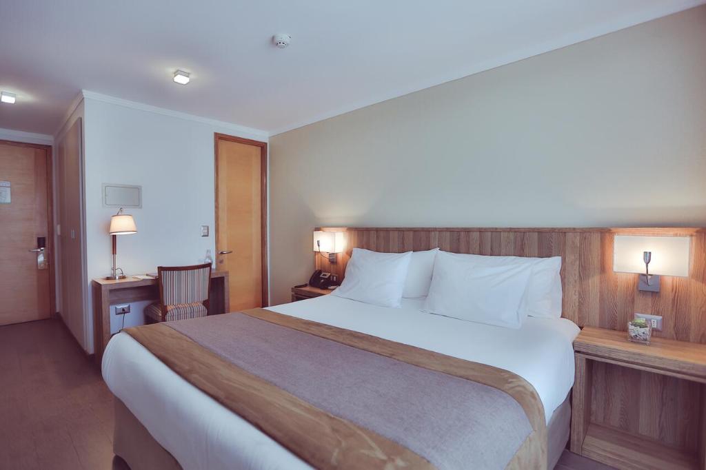 Cama o camas de una habitación en Hotel Atacama Suites