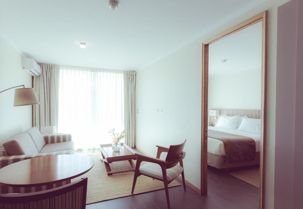 Cama o camas de una habitación en Hotel Atacama Suites
