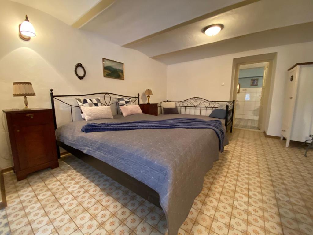 A bed or beds in a room at Vila Nízke Tatry