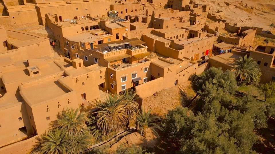 an aerial view of a village in the desert at Kasbah El Hajja in Aït Benhaddou