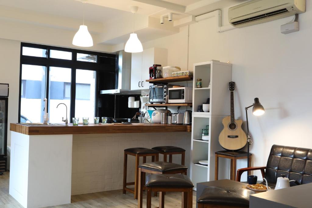 Kuchyň nebo kuchyňský kout v ubytování Dongshan Yi Hostel