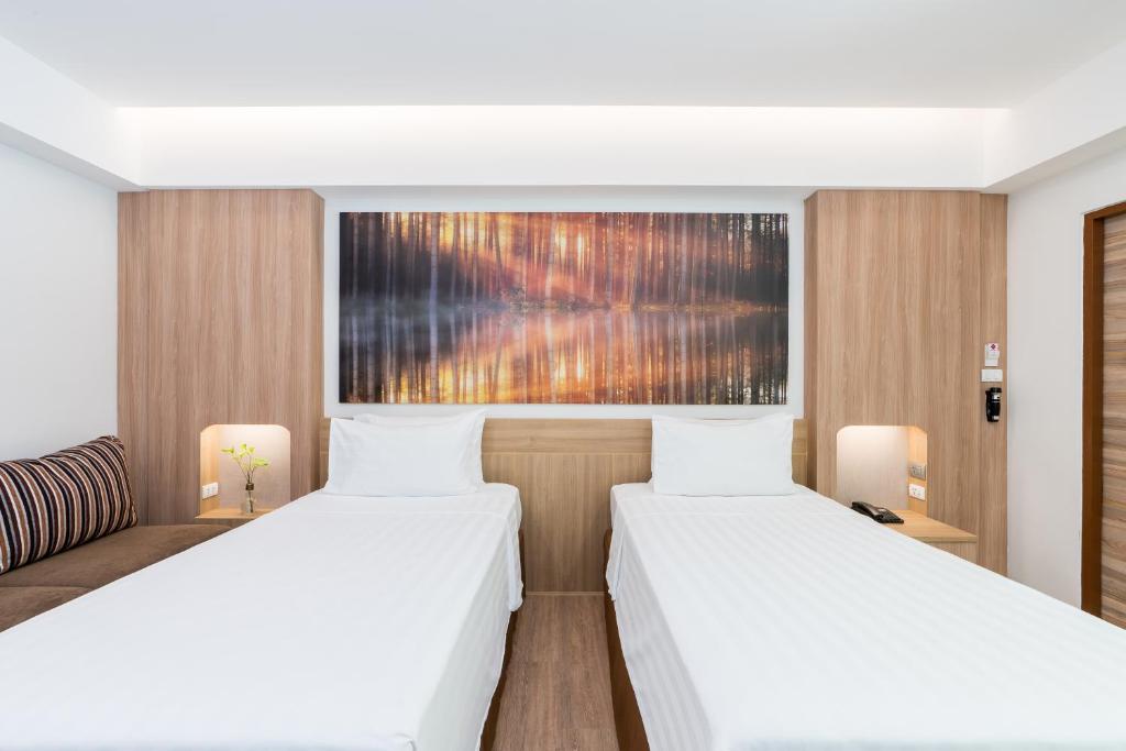 Postel nebo postele na pokoji v ubytování Chaba Cabana Beach Resort