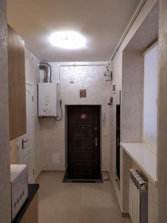 Kuchyň nebo kuchyňský kout v ubytování RynOK 25 Modern Lviv Center