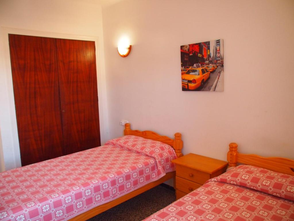 Postel nebo postele na pokoji v ubytování MIRAMAR 19B