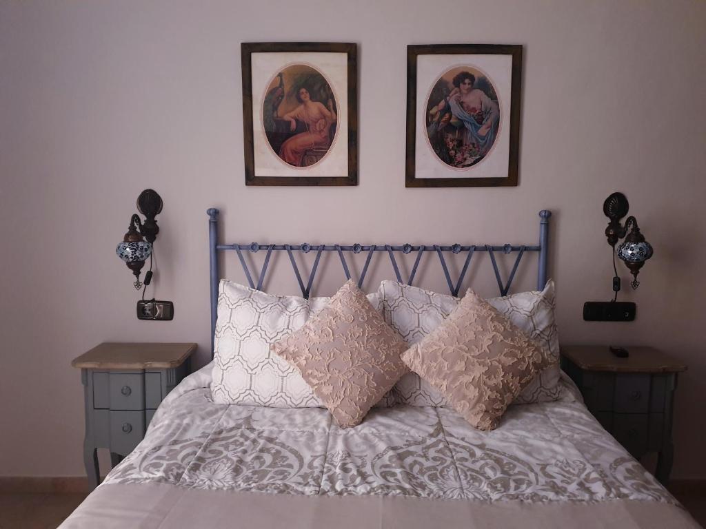 Cama o camas de una habitación en Hospedería El Caravansar