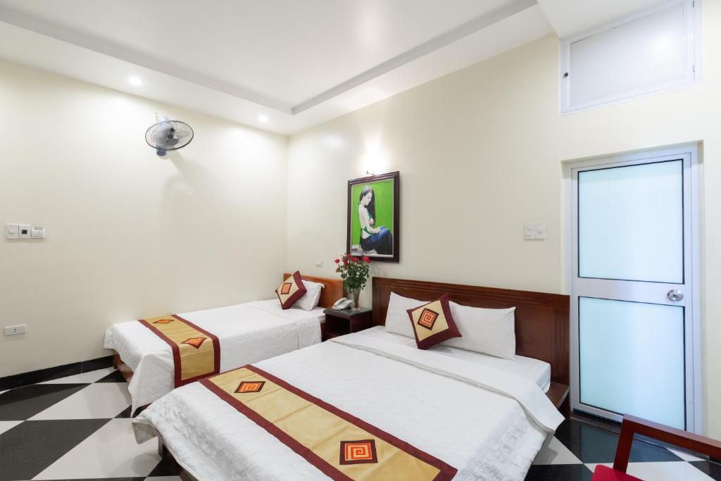 Postel nebo postele na pokoji v ubytování Titanic 2 Hotel