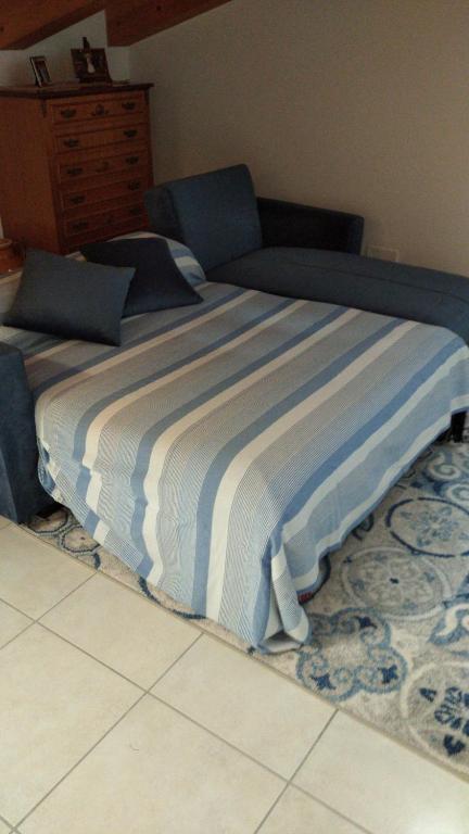 Postel nebo postele na pokoji v ubytování Delle Rose apartment