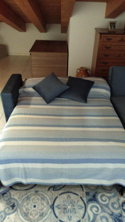 Postel nebo postele na pokoji v ubytování Delle Rose apartment