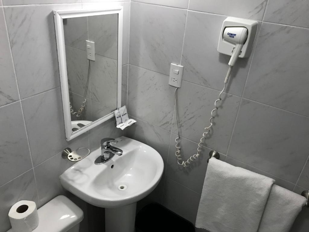 Koupelna v ubytování Hotel Oriente