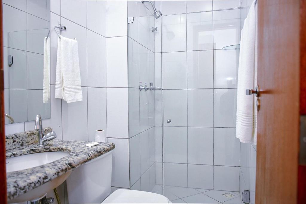 Koupelna v ubytování Pioneiro Hotel