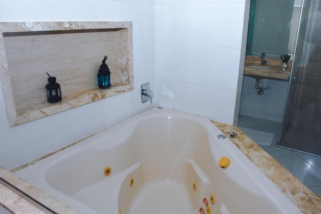 Koupelna v ubytování Pioneiro Hotel