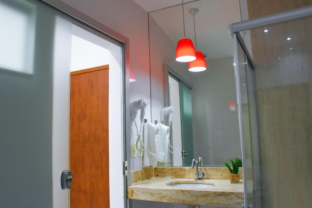 Koupelna v ubytování Pioneiro Hotel