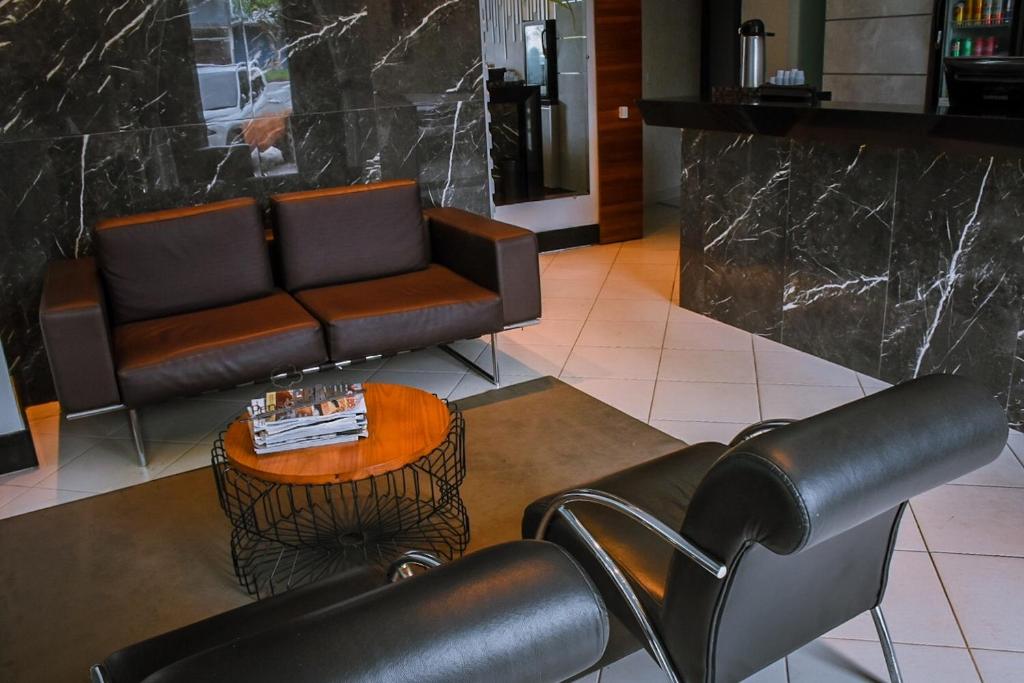 Posezení v ubytování Pioneiro Hotel