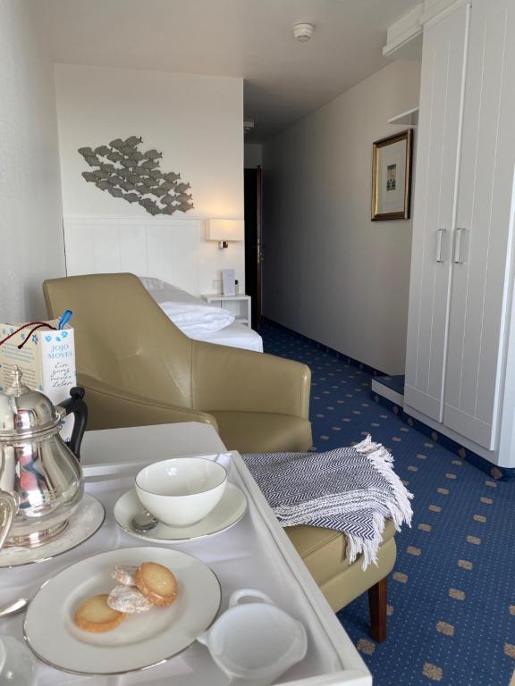 Postel nebo postele na pokoji v ubytování Hotel Wünschmann