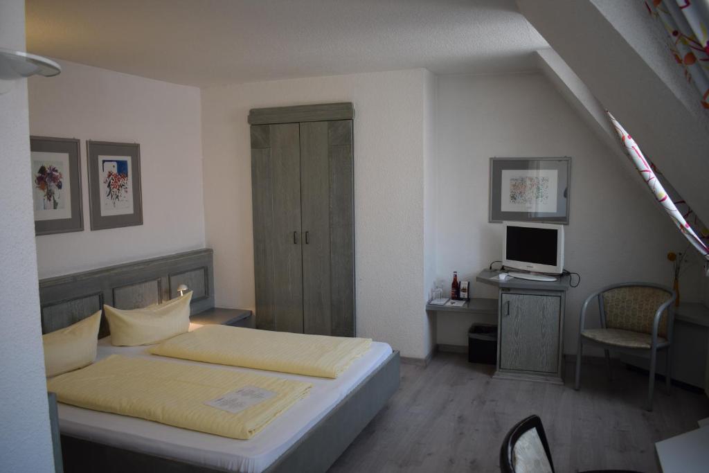Postel nebo postele na pokoji v ubytování Avenue Hotel