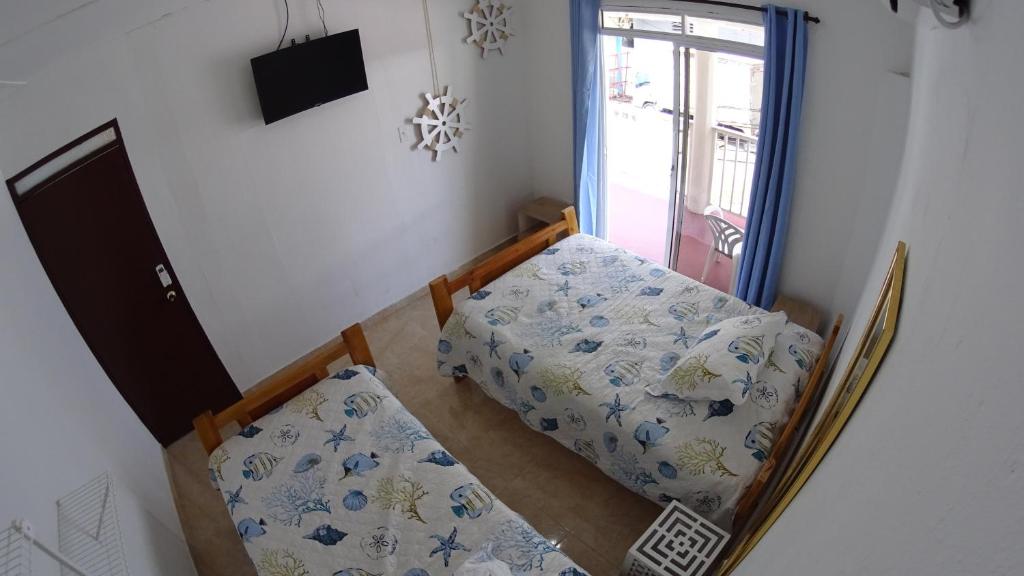 Postel nebo postele na pokoji v ubytování Marmows Place