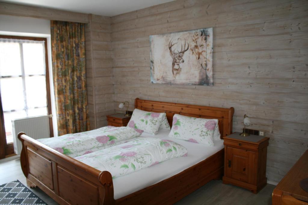 Postel nebo postele na pokoji v ubytování Waldpension Jägerstüberl
