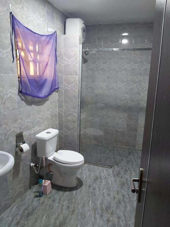Koupelna v ubytování StayCation Suites And Apartment