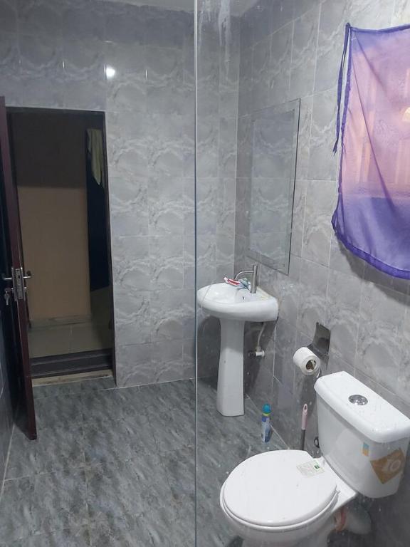 Koupelna v ubytování StayCation Suites And Apartment