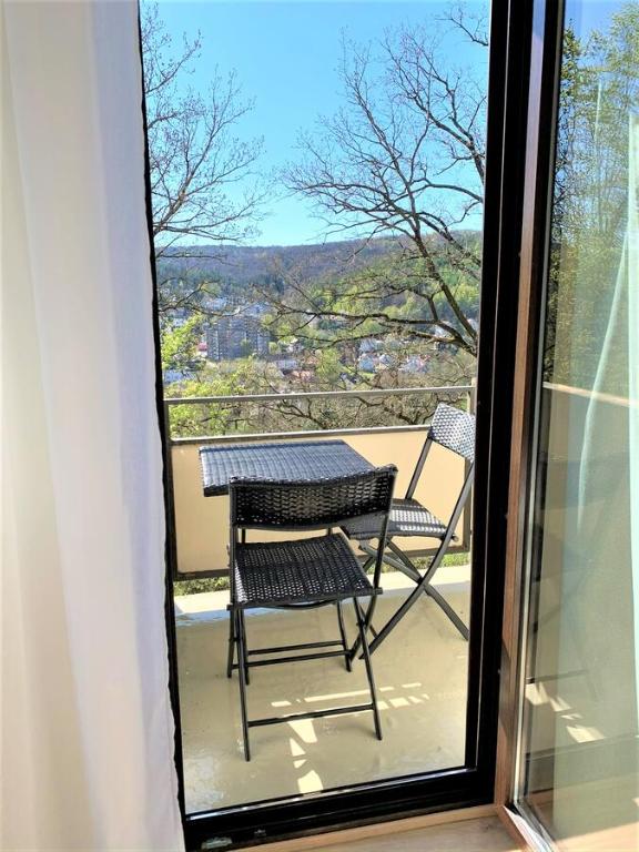 Balkón nebo terasa v ubytování Top Modernes 1-Zimmer-Apartment mit Küche, Parkplatz, kostenfreiem WLAN und Netflix