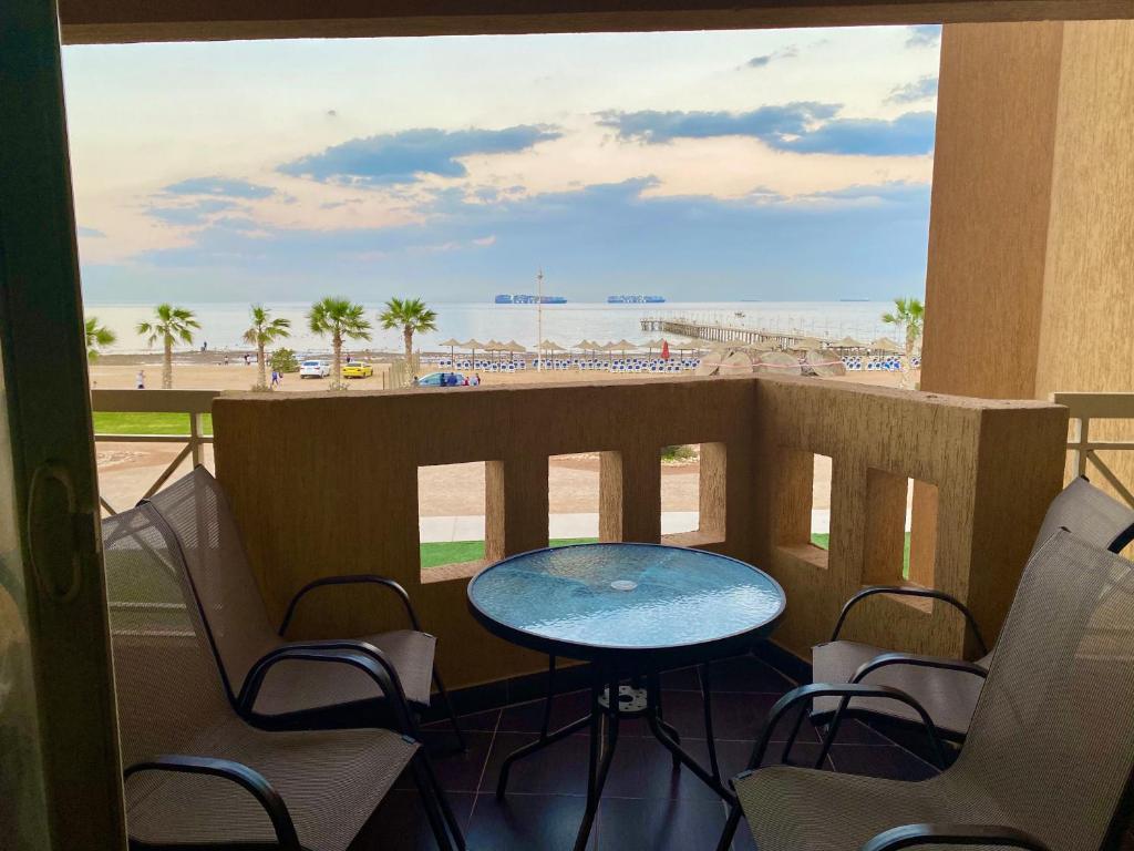 A balcony or terrace at Porto South Beach Royal Sea view families صف اول بحر مباشر