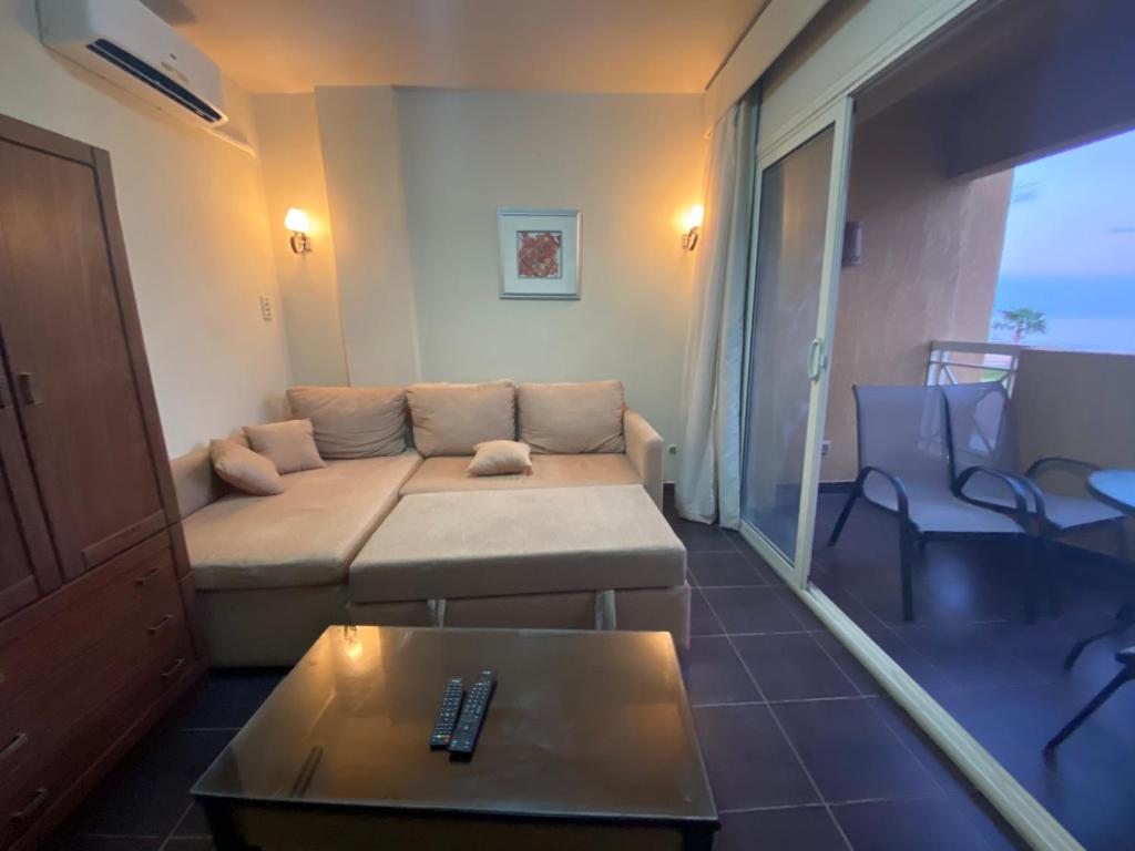 A seating area at Porto South Beach Royal Sea view families صف اول بحر مباشر