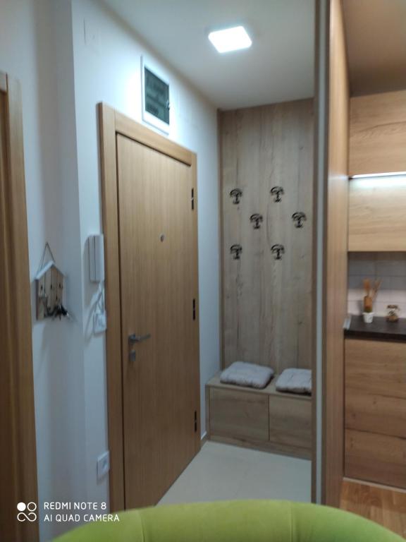 Postel nebo postele na pokoji v ubytování Apartman Prezident In