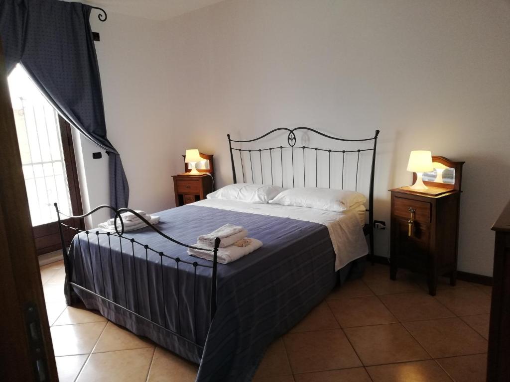 Postel nebo postele na pokoji v ubytování Casa Sbrizza