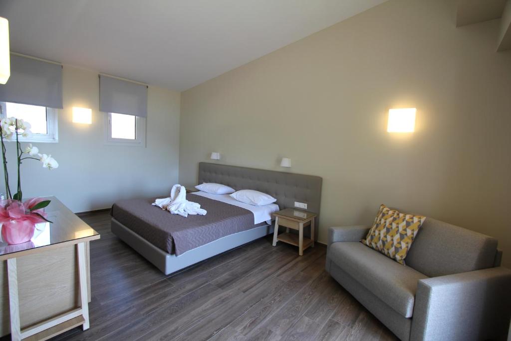 Postel nebo postele na pokoji v ubytování Cosmos Hotel