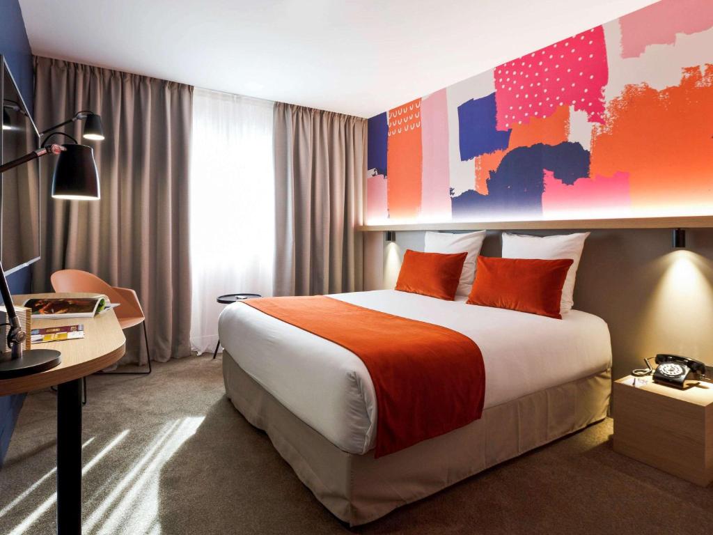 Postel nebo postele na pokoji v ubytování Mercure Lyon Charbonnières