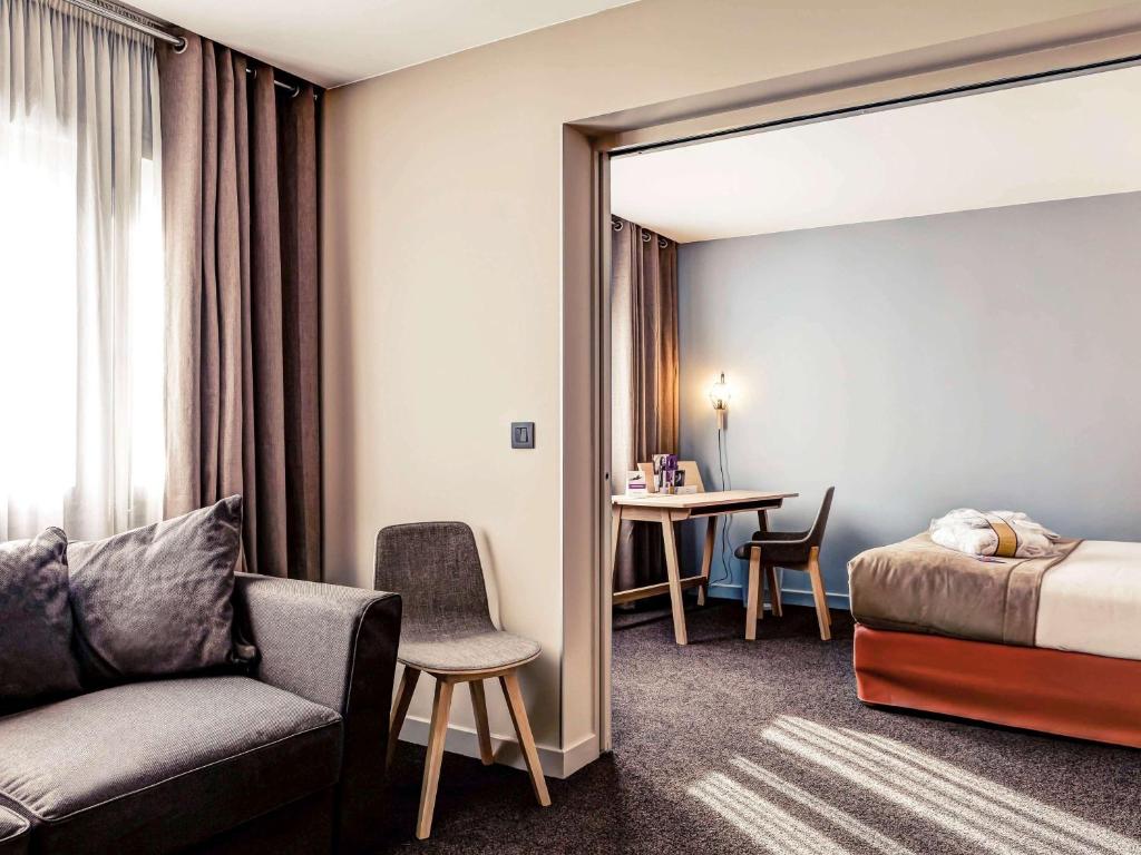 Postel nebo postele na pokoji v ubytování Mercure Lyon Charbonnières
