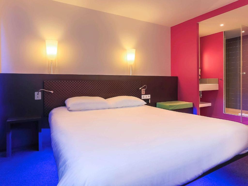 Postel nebo postele na pokoji v ubytování ibis Styles Lorient Caudan