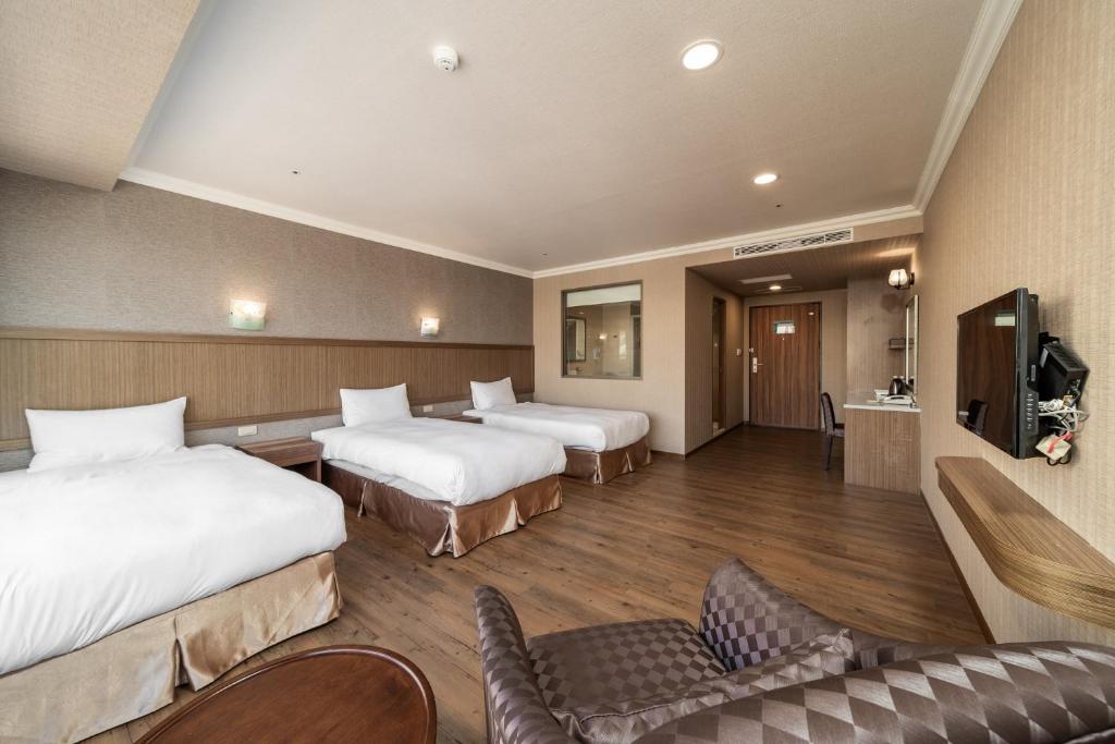 A television and/or entertainment centre at Fish Hotel-Pingtung