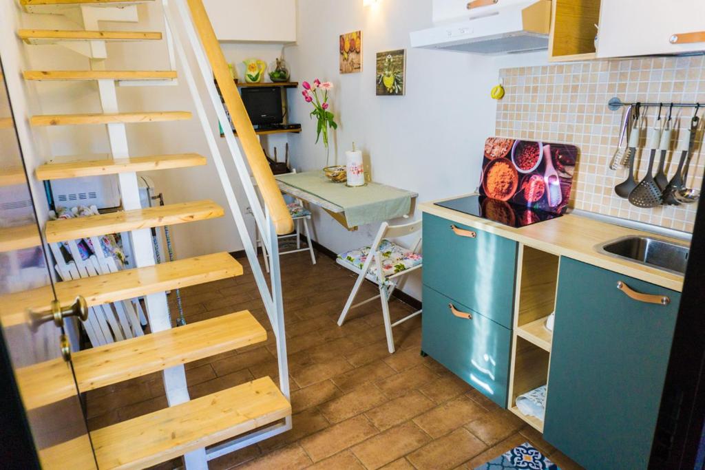 Kuchyň nebo kuchyňský kout v ubytování Appartamento Palma