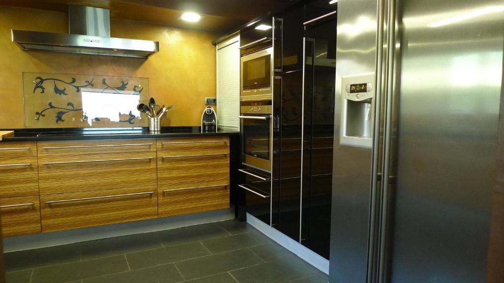 Kuchyň nebo kuchyňský kout v ubytování CasaCampelles II - Vall de Núria - Ripollès