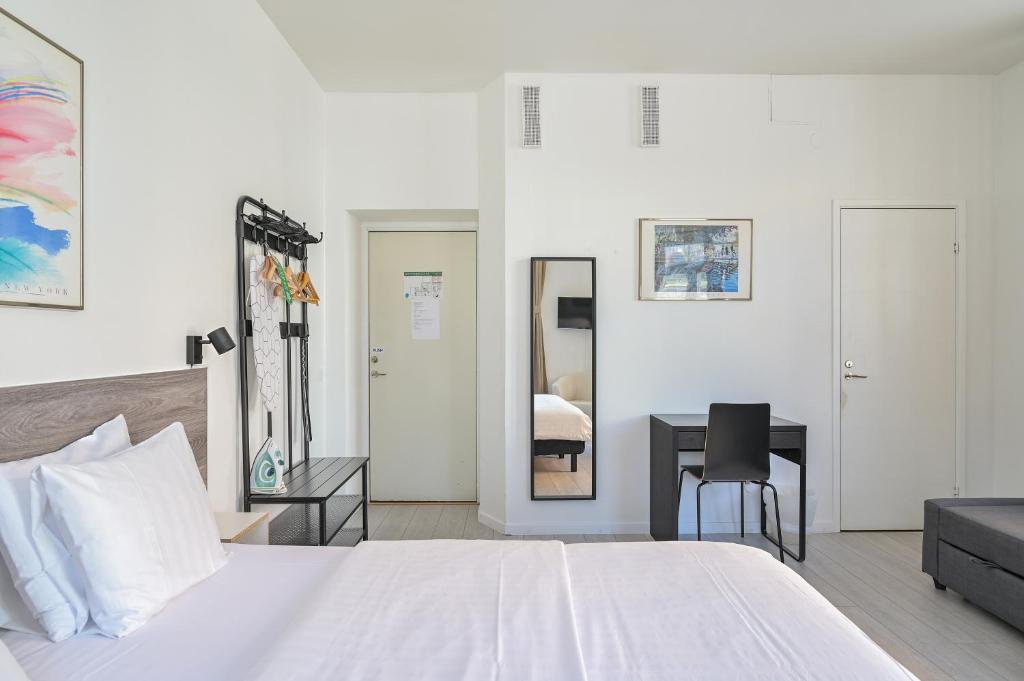 Postel nebo postele na pokoji v ubytování Hotel Bema