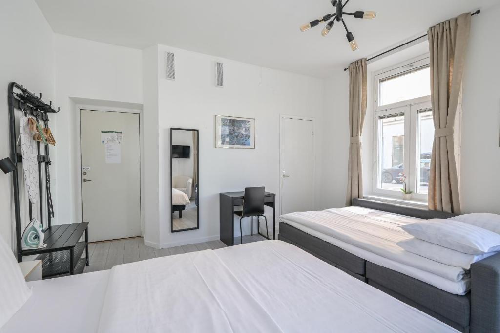 Postel nebo postele na pokoji v ubytování Hotel Bema